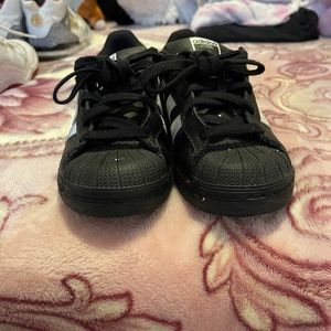 Black and white adidas 1.5 Y